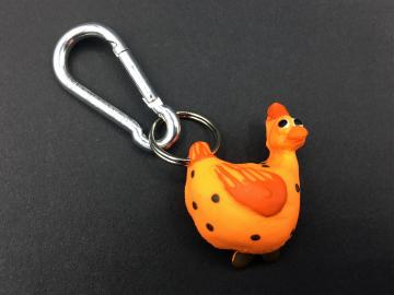 Schlüsselanhänger Kautschuk Hühner orange gepunktet  