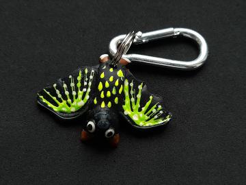 Schlüsselanhänger Kautschuk Fledermaus schwarz grüne Flügel