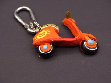 Schlüsselanhänger Kautschuk Roller orange